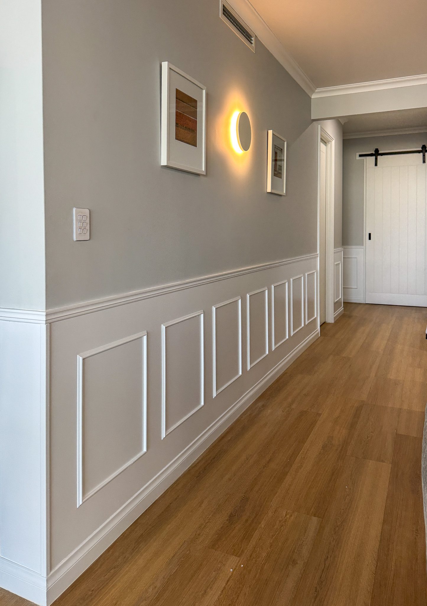 Hamptons style dado rail and custom-built white doors in Mariner’s Cove townhouse by Love Building Co Mandurah.